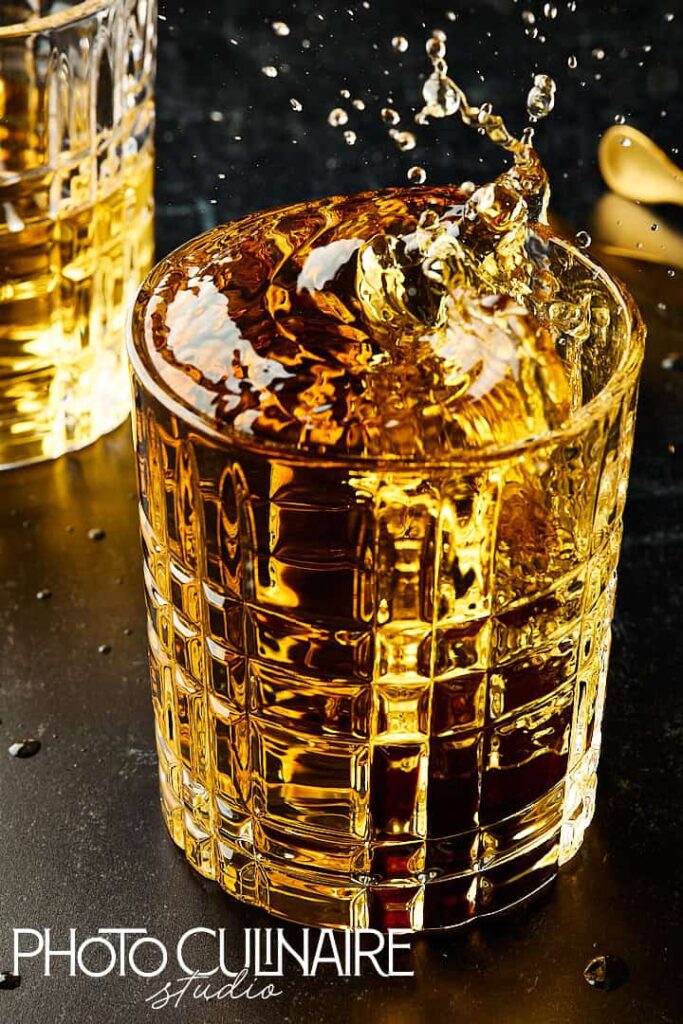 whiskey splash shot with fast shutter speed 